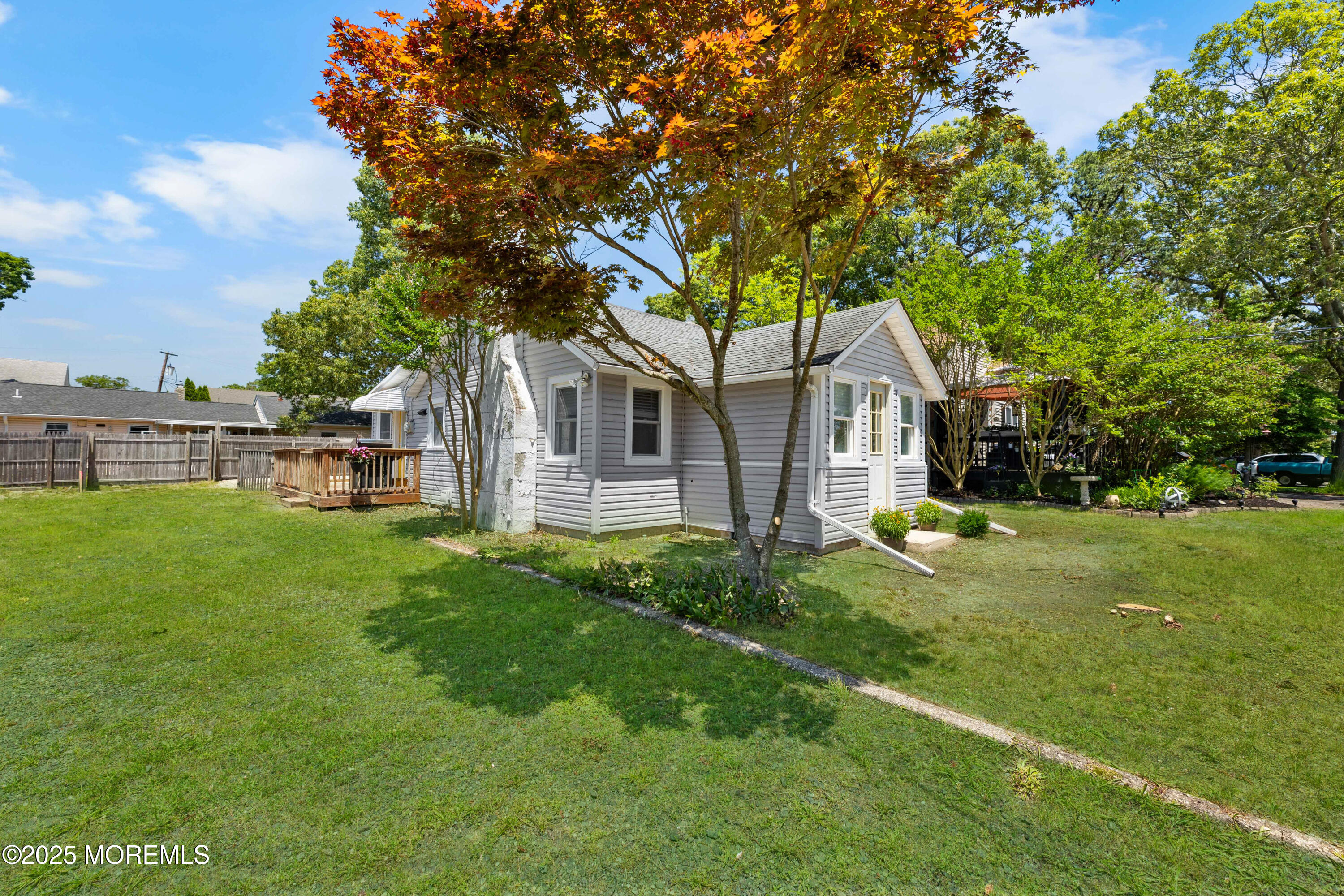 474 Burnt Bark Road Brick, NJ 08723 - Photo 3 of 28 a front view of house with yard and green space
