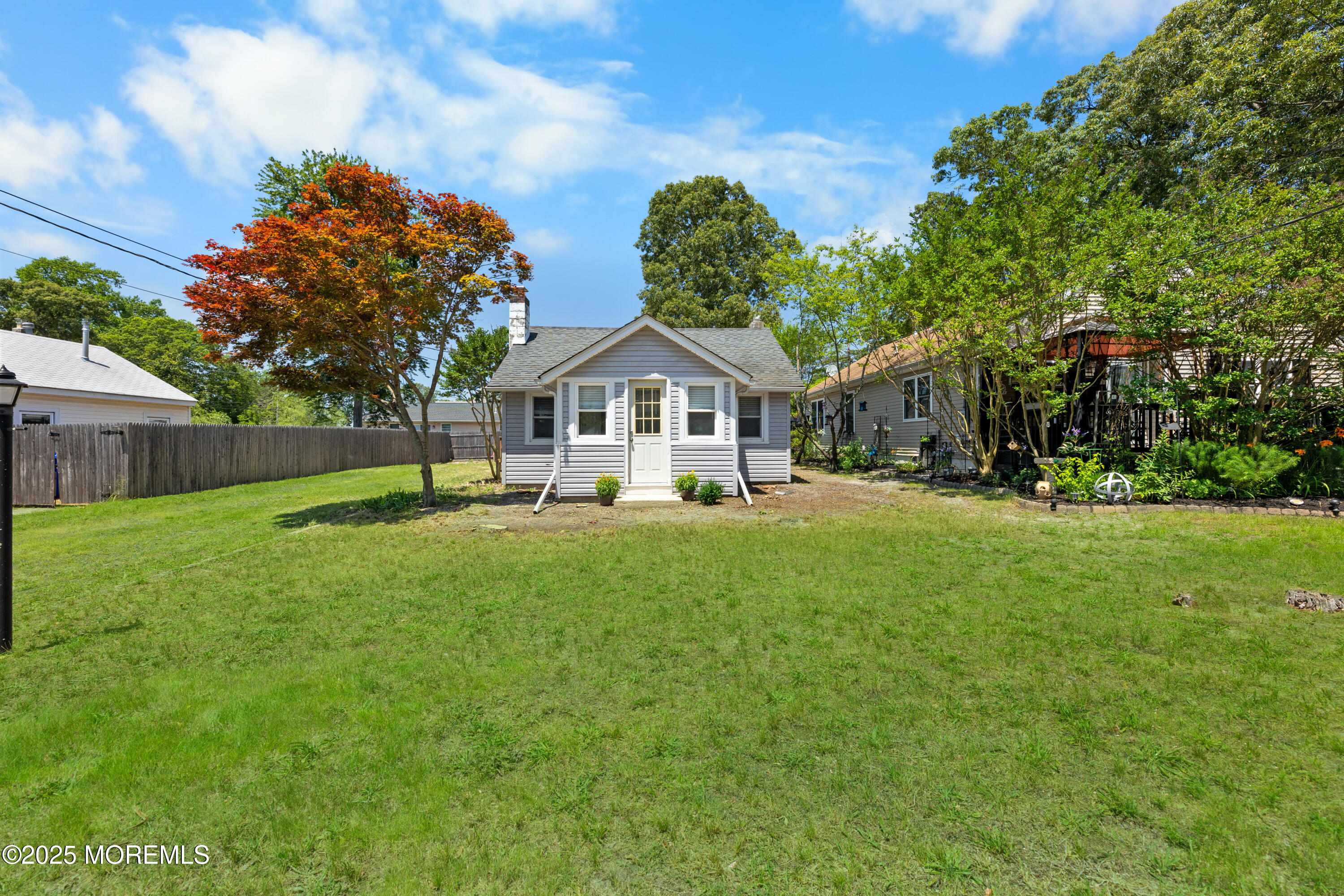 474 Burnt Bark Road Brick, NJ 08723 - Photo 4 of 28 a front view of house with yard and green space