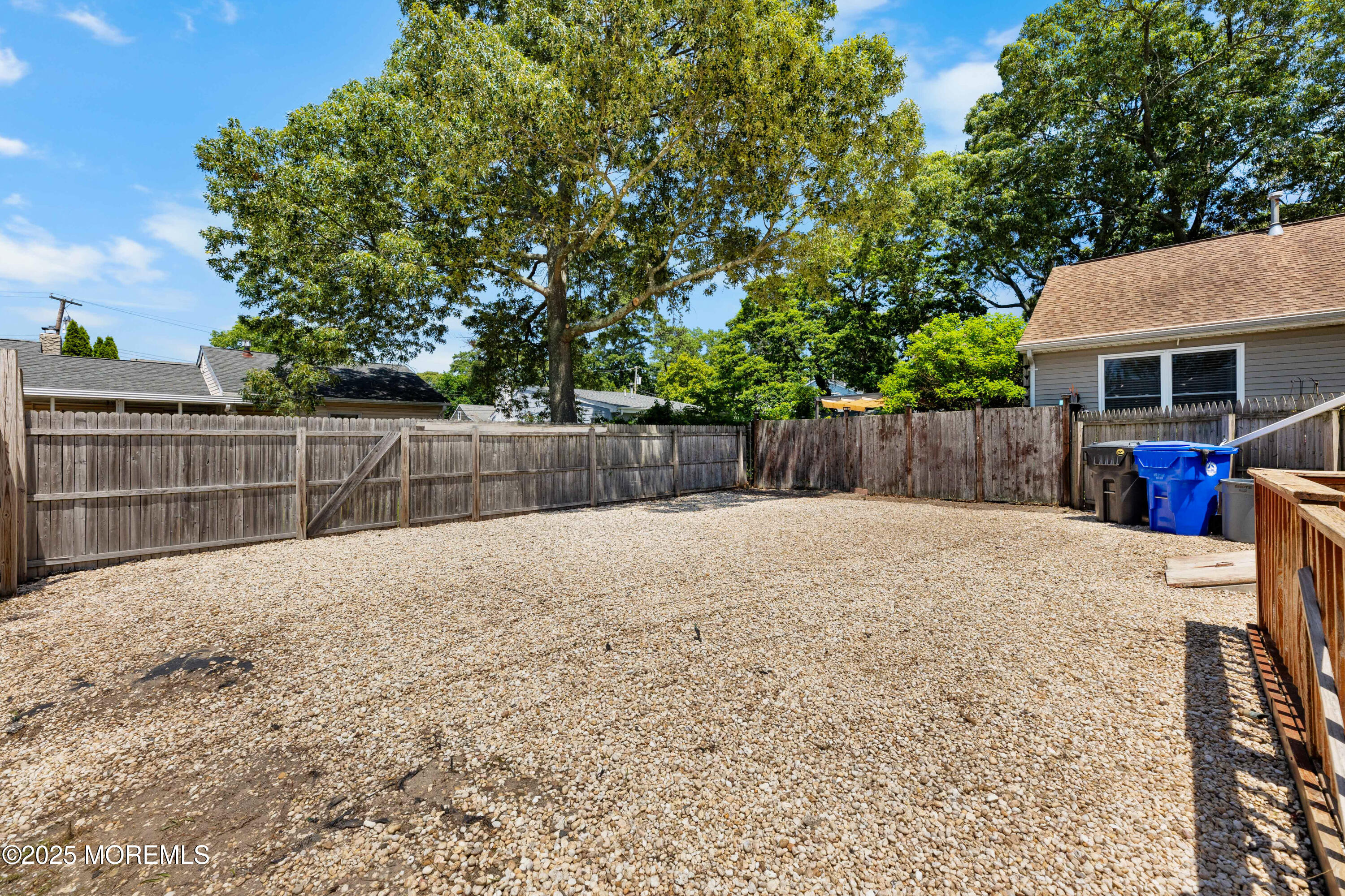 474 Burnt Bark Road Brick, NJ 08723 - Photo 5 of 28 a view of a backyard with a barbeque and large trees