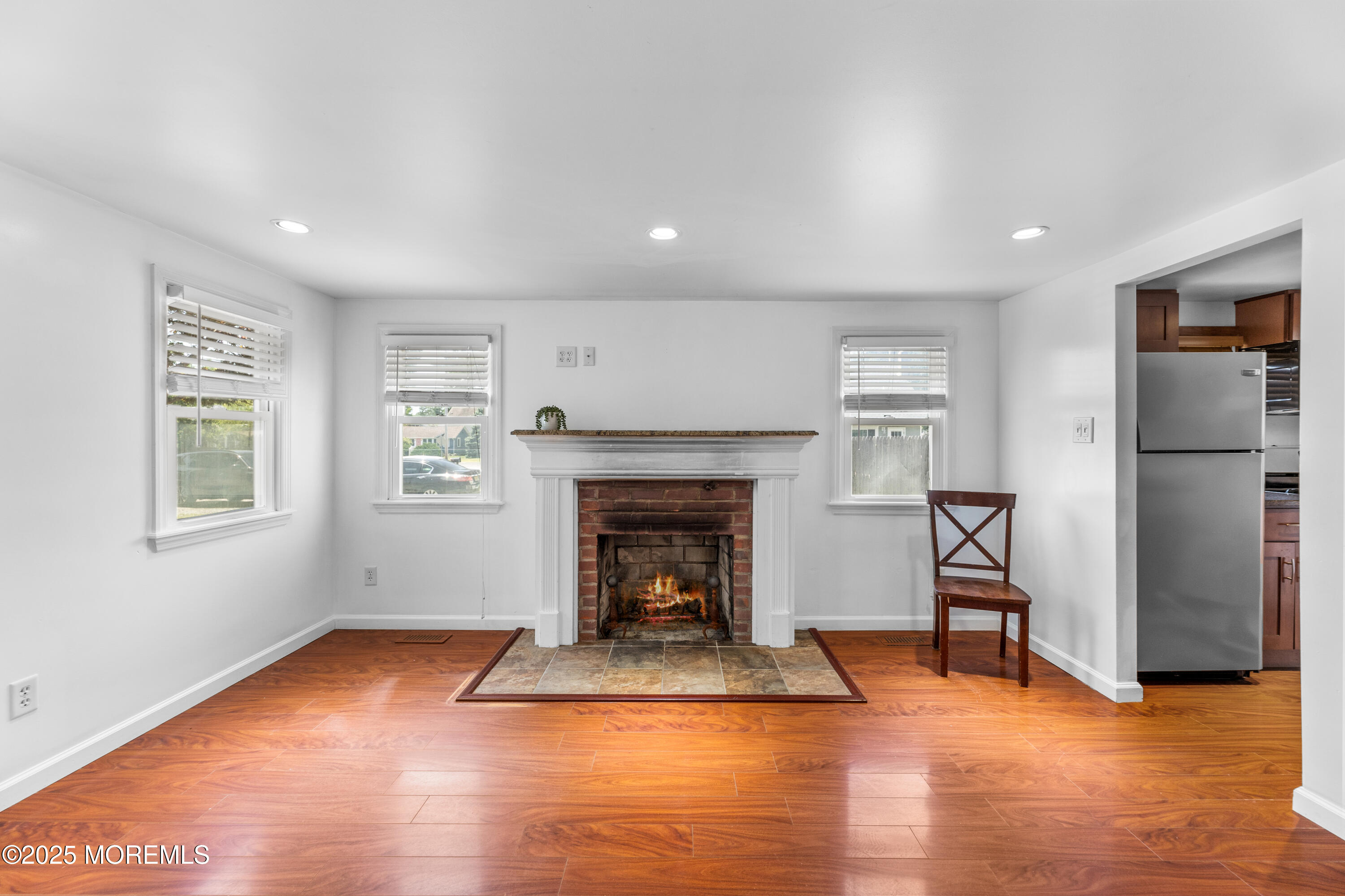 474 Burnt Bark Road Brick, NJ 08723 - Photo 8 of 28 a living room with furniture and a fireplace