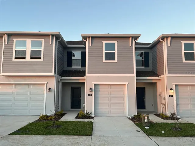 a front view of house with yard