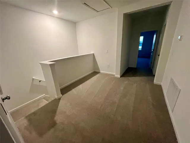 a view of a room with an empty space