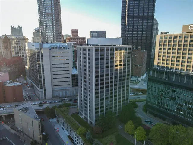 a view of a city with tall buildings