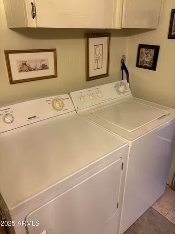 a bathroom with a toilet a sink and a shower