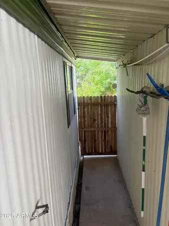 a view of a backyard of the house