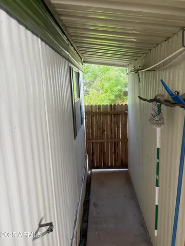 a view of a backyard of the house