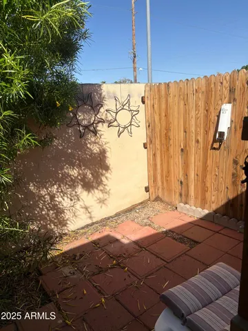 a view of jacuzzi with patio
