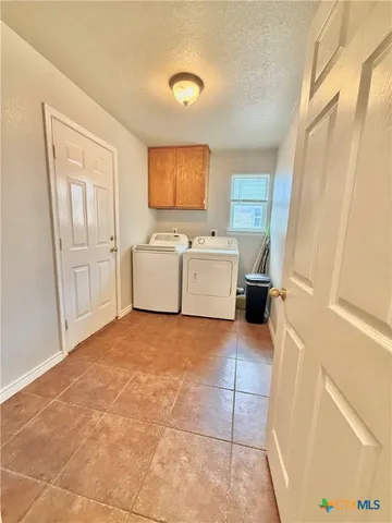 a room with dryer and washer
