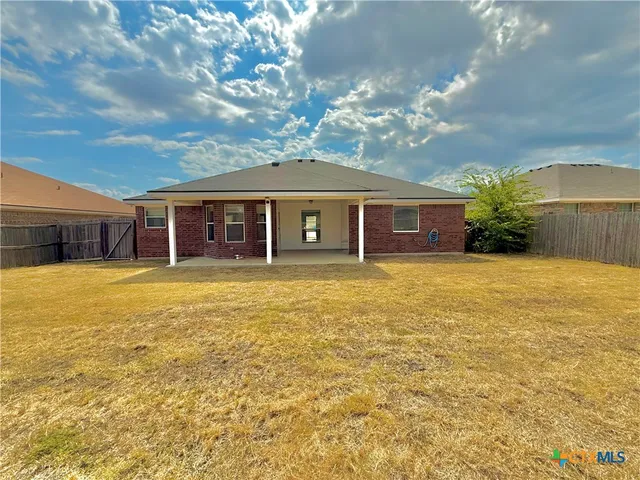 a view of a house with a swimming pool