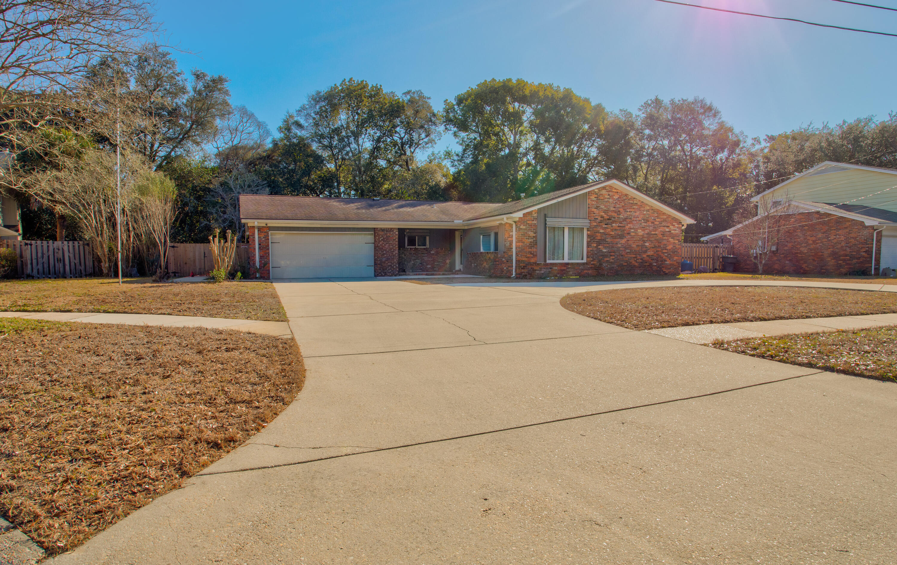 60 Linwood Road Northwest Fort Walton Beach, FL 32547 - Photo 3 of 14 front view of a house with a yard