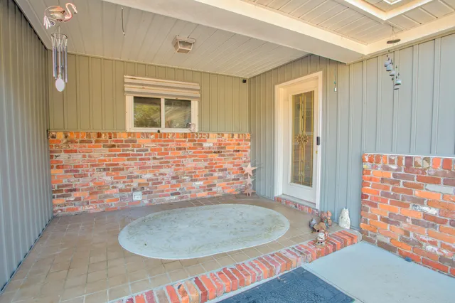 a bathroom with a sink and shower