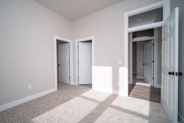 a view of a room with a wardrobe space