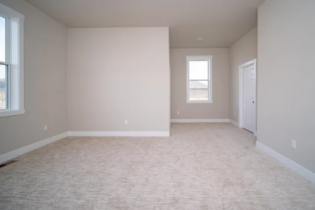 an empty room with windows