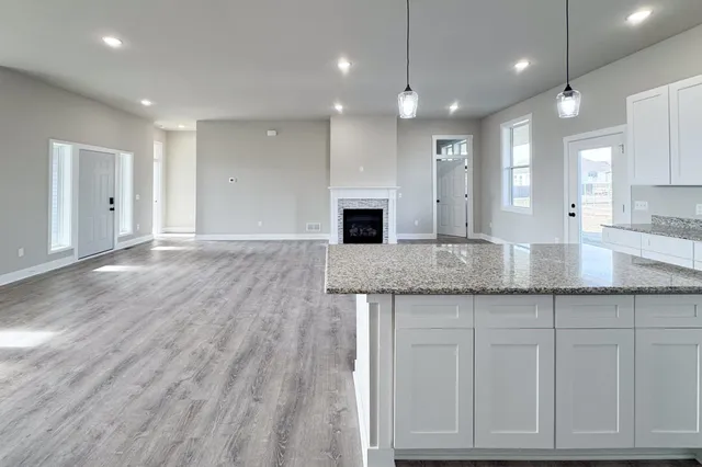 a bathroom with a sink and a large mirror