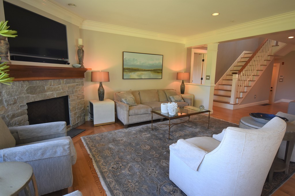 6 Atlantic View, Unit 6 Amesbury, MA 01913 - Photo 14 of 42 a living room with furniture fireplace and flat screen tv