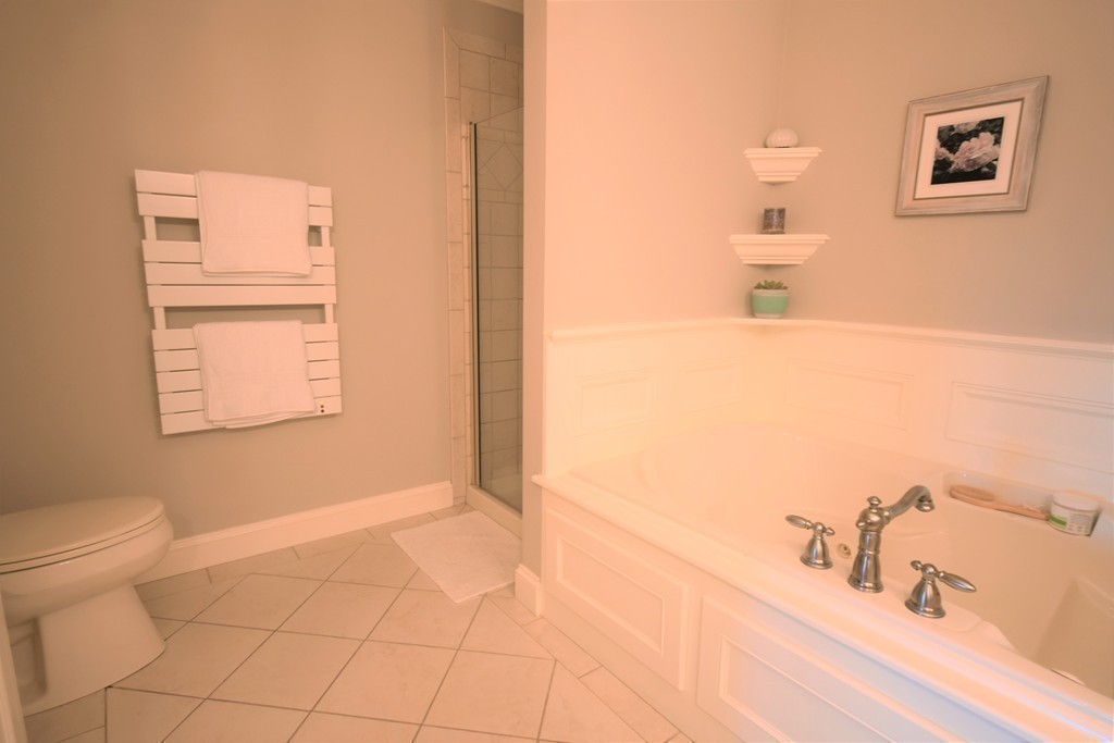 6 Atlantic View, Unit 6 Amesbury, MA 01913 - Photo 19 of 42 a bathroom with a sink and a toilet