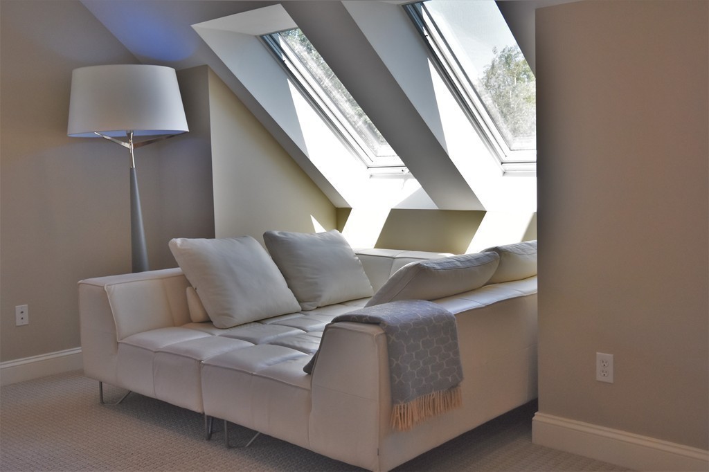 6 Atlantic View, Unit 6 Amesbury, MA 01913 - Photo 21 of 42 a living room with furniture and a window