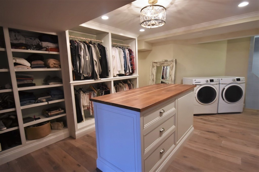 6 Atlantic View, Unit 6 Amesbury, MA 01913 - Photo 34 of 42 a utility room with stainless steel appliances wooden floor and a window