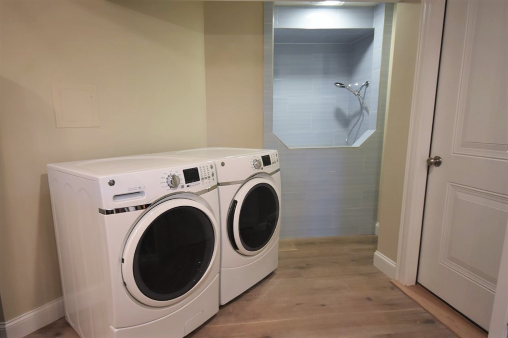 6 Atlantic View, Unit 6 Amesbury, MA 01913 - Photo 35 of 42 a utility room with dryer and washer