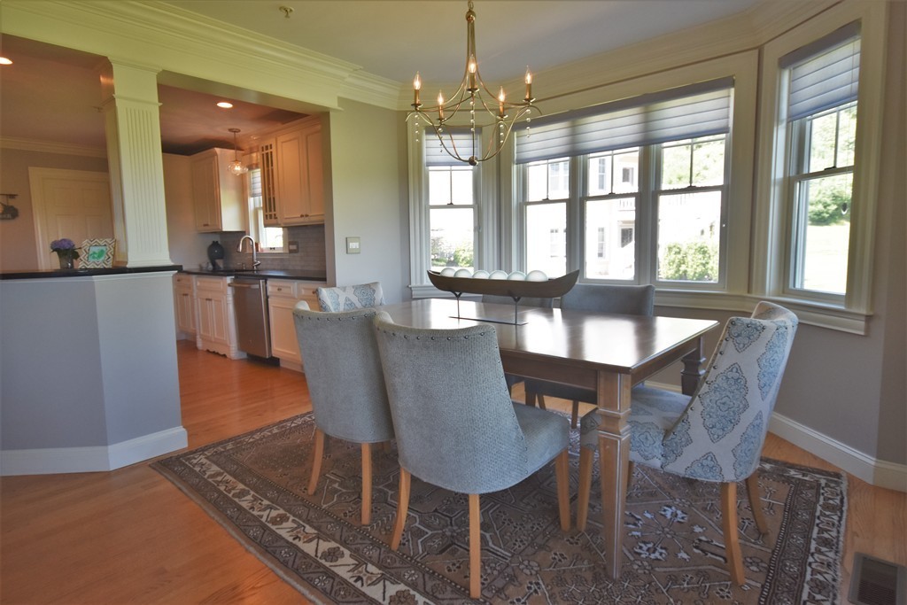 6 Atlantic View, Unit 6 Amesbury, MA 01913 - Photo 6 of 42 a view of a dining room with furniture window and outside view