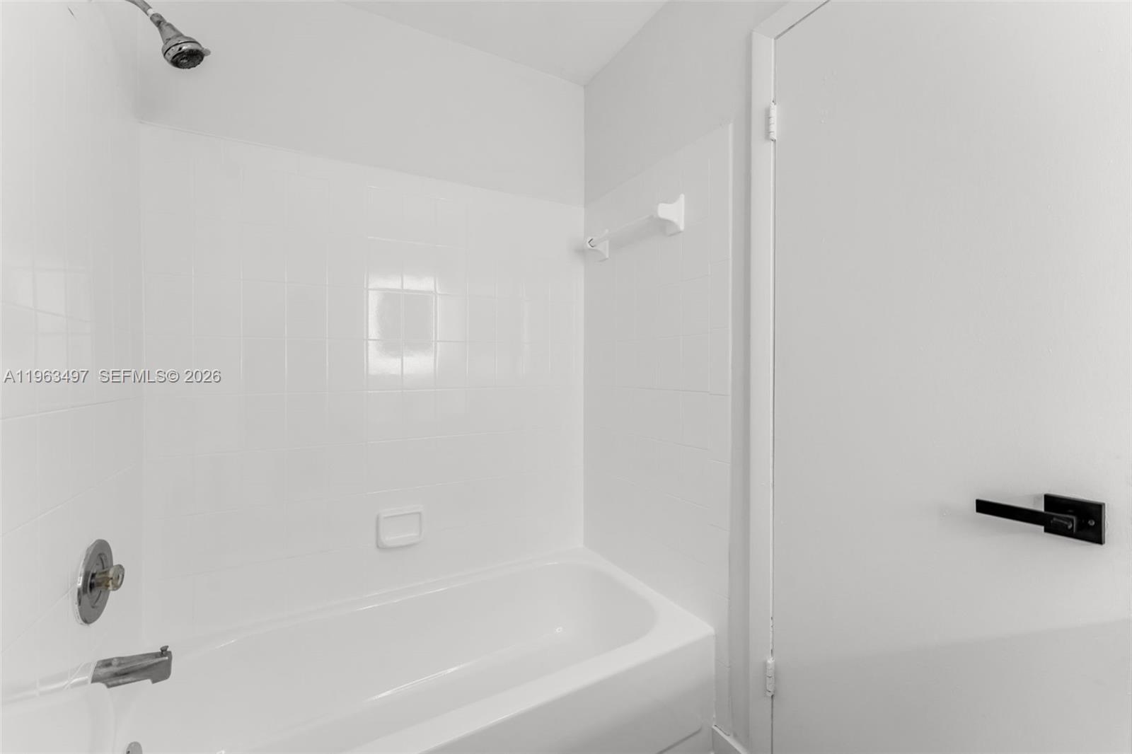 15430 Southwest 74th Cir Court Miami, FL 33193 - Photo 20 of 38 a close up of a bathtub