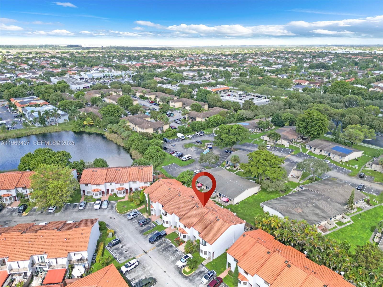 15430 Southwest 74th Cir Court Miami, FL 33193 - Photo 36 of 38 an aerial view of residential houses with outdoor space