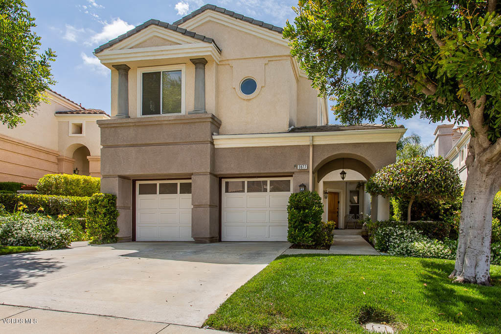 3877 Sunsetridge Road Moorpark, CA 93021 - Photo 1 of 30 a front view of a house with a garden