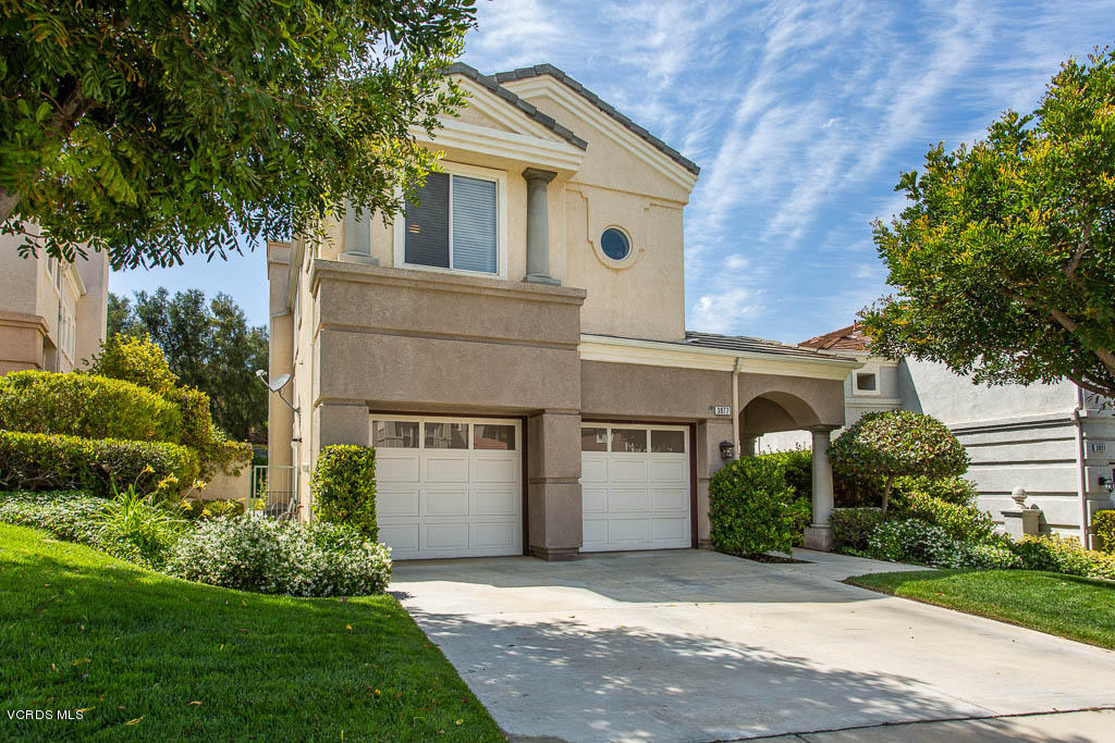 3877 Sunsetridge Road Moorpark, CA 93021 - Photo 2 of 30 a front view of a house with a yard