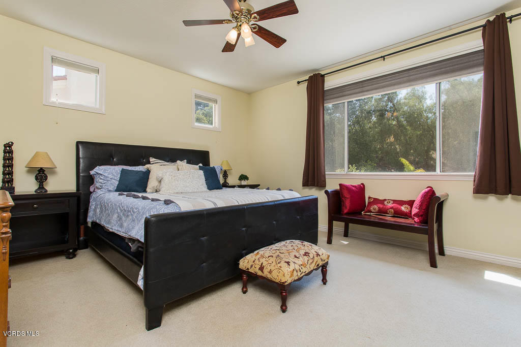 3877 Sunsetridge Road Moorpark, CA 93021 - Photo 14 of 30 a bedroom with a bed and a couch