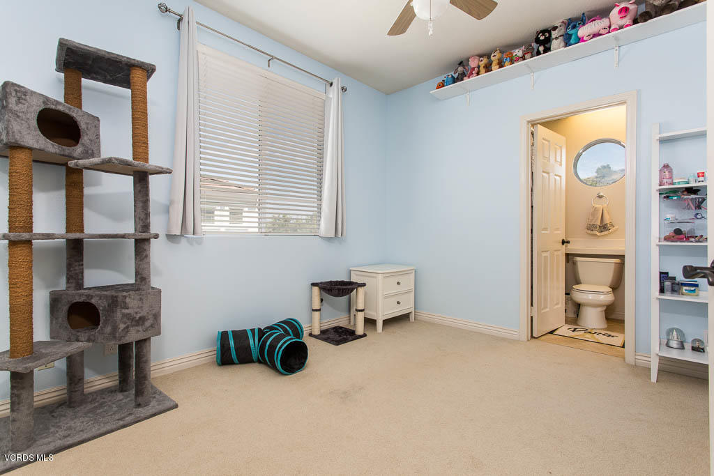3877 Sunsetridge Road Moorpark, CA 93021 - Photo 20 of 30 a room with furniture and a window