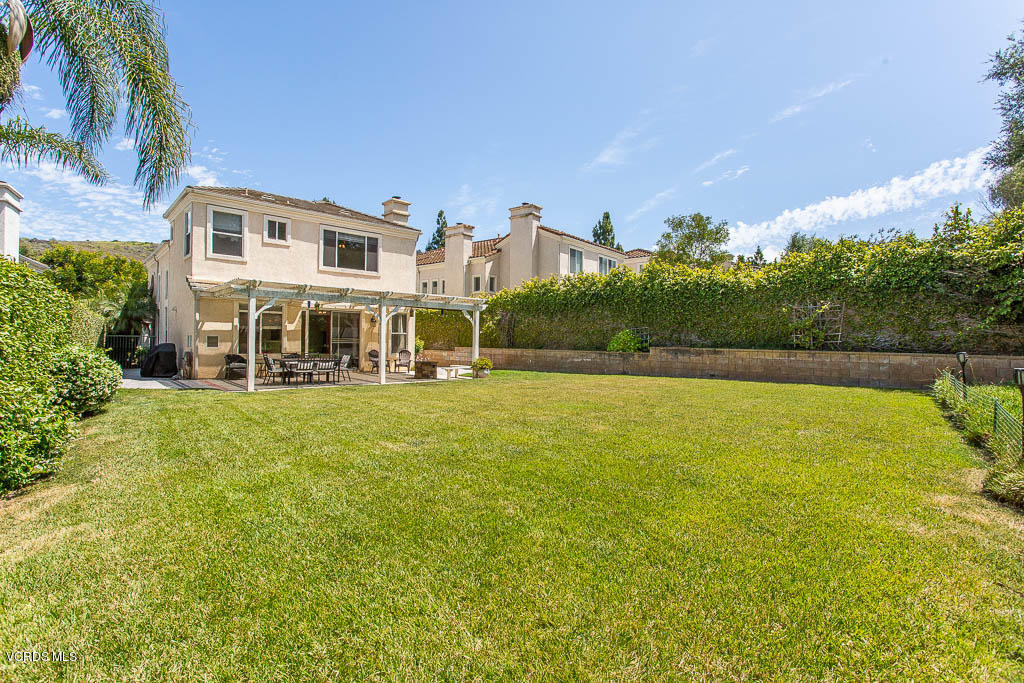 3877 Sunsetridge Road Moorpark, CA 93021 - Photo 23 of 30 a front view of a house with a yard