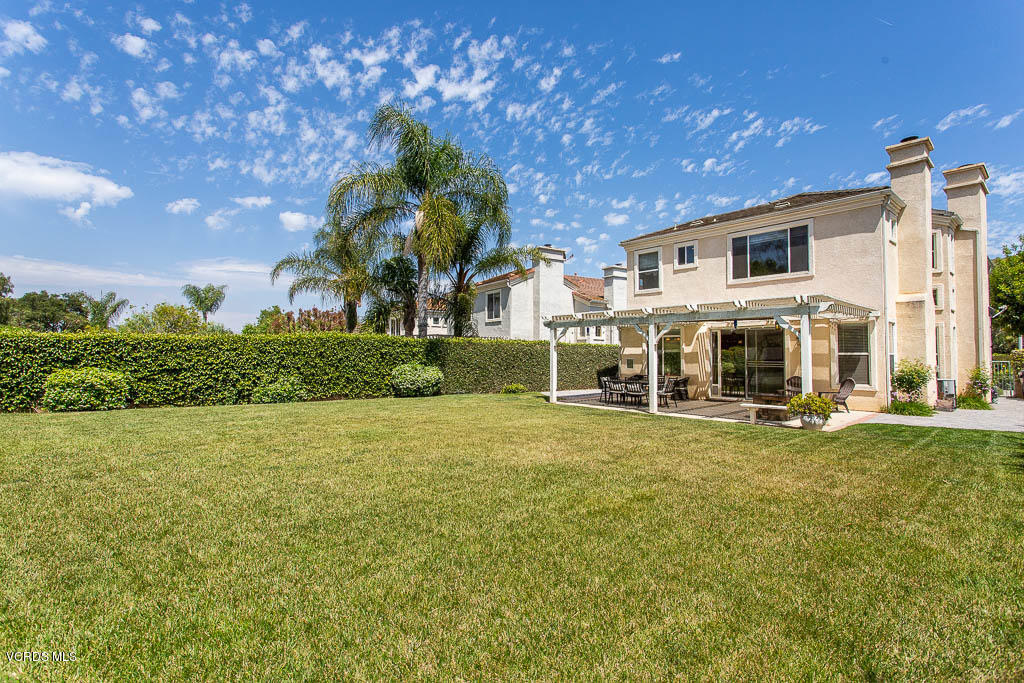 3877 Sunsetridge Road Moorpark, CA 93021 - Photo 24 of 30 a front view of a house with a garden