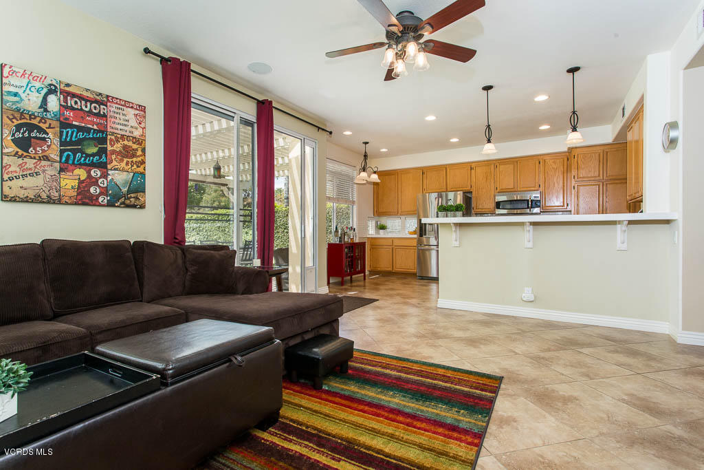 3877 Sunsetridge Road Moorpark, CA 93021 - Photo 9 of 30 a living room with furniture and a floor to ceiling window