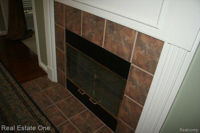 434 Springview Drive Rochester, MI 48307 - Photo 13 of 17 two way fireplace.JPG