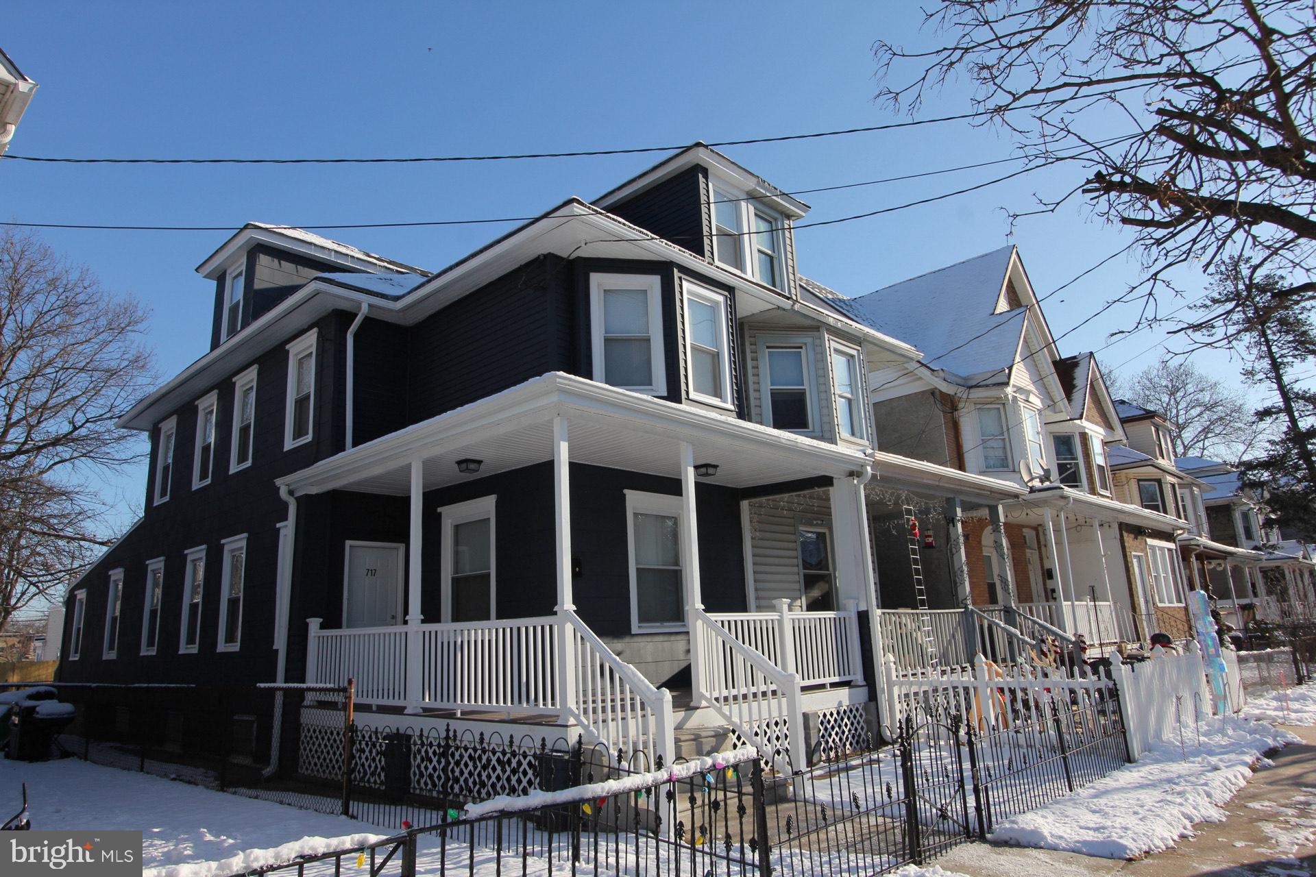 717 Hunter Street Gloucester City, NJ 08030 - Photo 1 of 31 a front view of a house with balcony