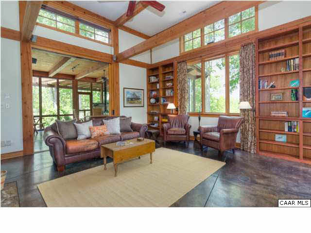 Soaring ceilings, abundant windows and built-ins are found in the great room.