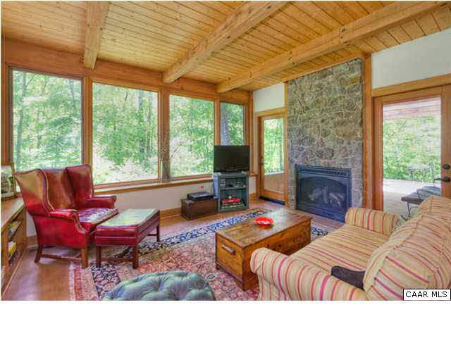 4135 Red Hill Road Charlottesville, VA 22903 - Photo 25 of 36 ...stone fireplace that opens to...
