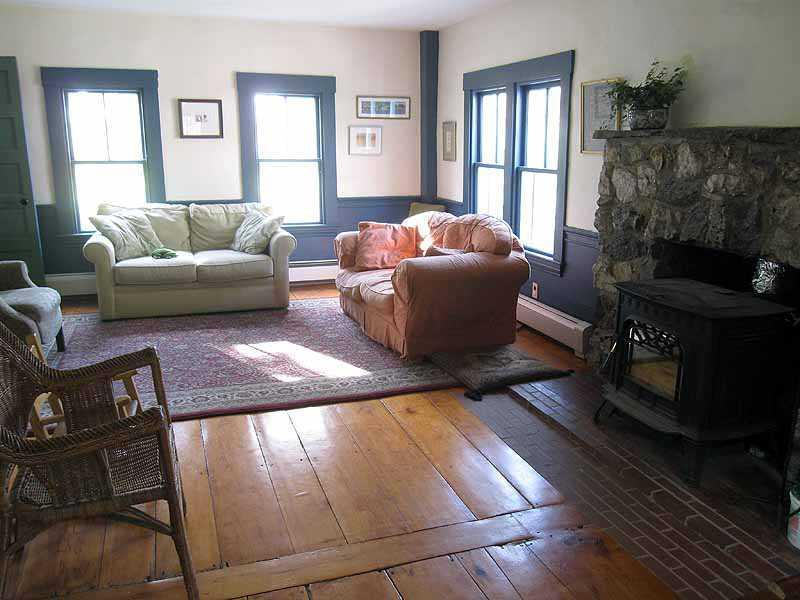 440 East Neck Road Nobleboro, ME 04555 - Photo 17 of 35 Living Room. From the dining area,...