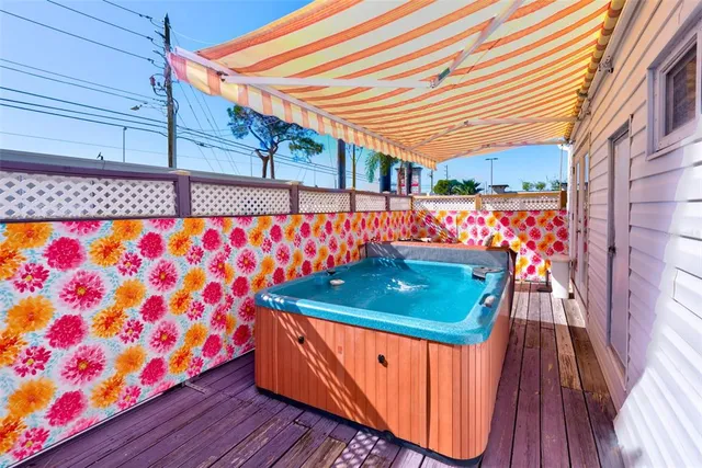 a room with umbrella on wall and wooden floor