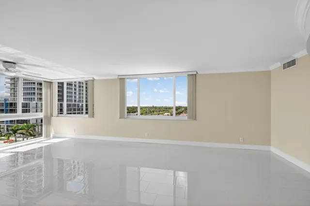 a spacious bathroom with a shower sink and a mirror