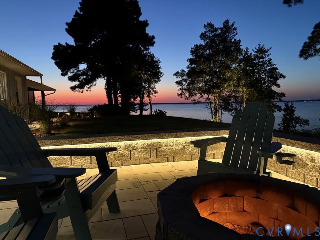 560 Eubank Landing Road Topping, VA 23169 - Photo 21 of 50 a view of swimming pool from a outdoor seating