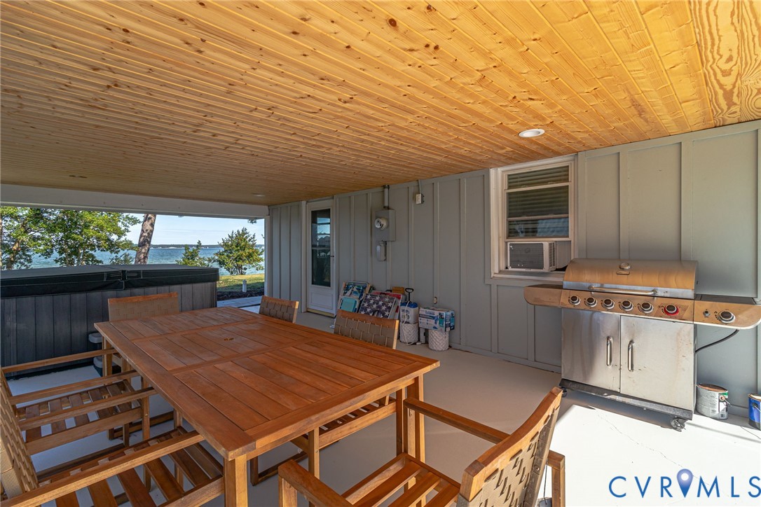 560 Eubank Landing Road Topping, VA 23169 - Photo 42 of 50 a outdoor space with furniture