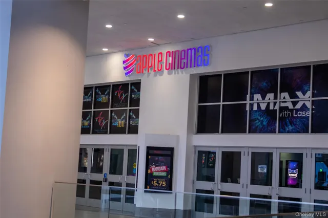 a living room with lots of furniture and toys