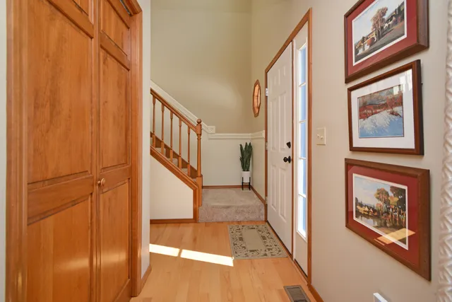 a bathroom with a granite countertop sink mirror and shower