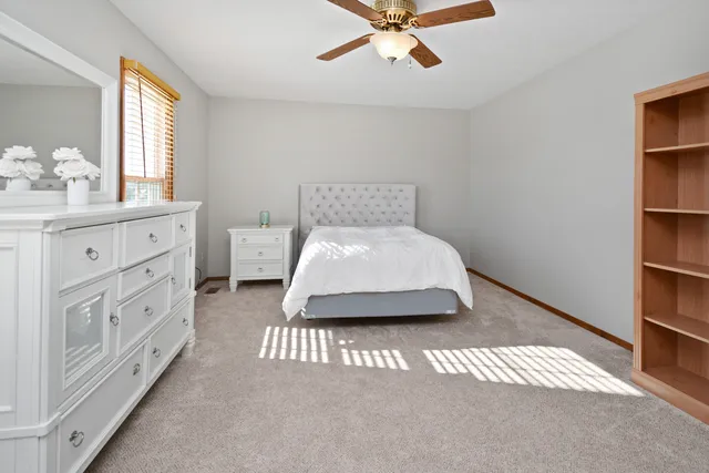 a kitchen with stainless steel appliances granite countertop a sink and a window