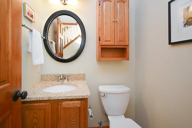 a kitchen with stainless steel appliances granite countertop a stove and a microwave