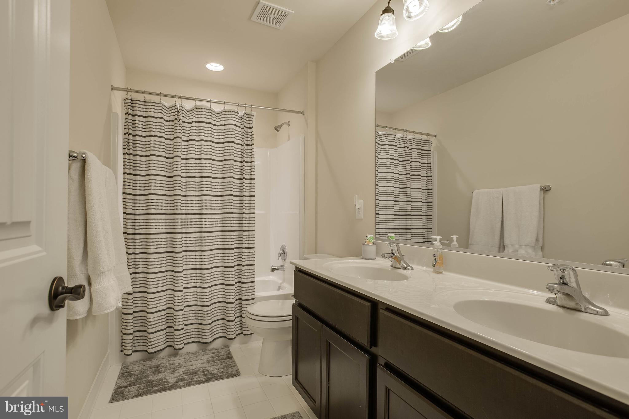 7131 Masters Road New Market, MD 21774 - Photo 30 of 44 Hall guest bath with dual sinks