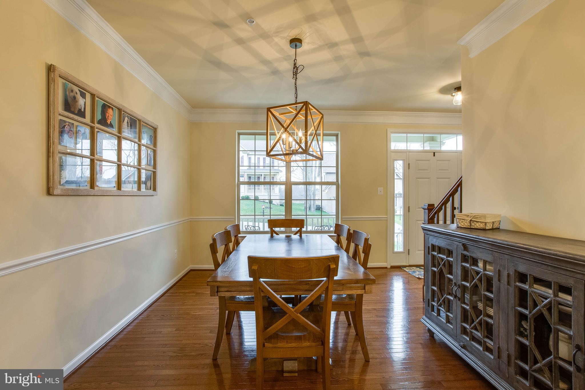 7131 Masters Road New Market, MD 21774 - Photo 6 of 44 Custom chandelier conveys. Chair and crown molding