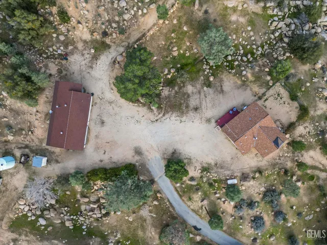 an aerial view of residential house with outdoor space