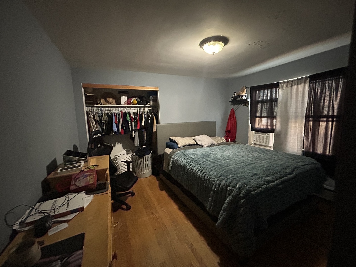 1724 North 19th Avenue Melrose Park, IL 60160 - Photo 12 of 16 a bedroom with a bed and a large window